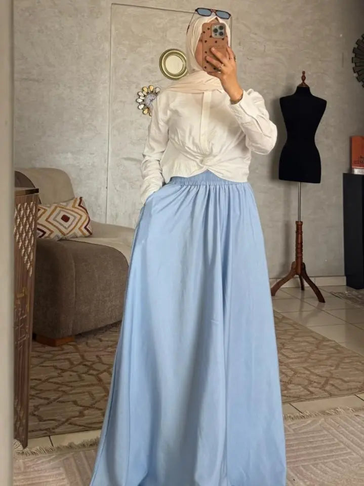 جيب كلوش طويل وفضفاض – الأناقة المحتشمة والعملية المتكاملة